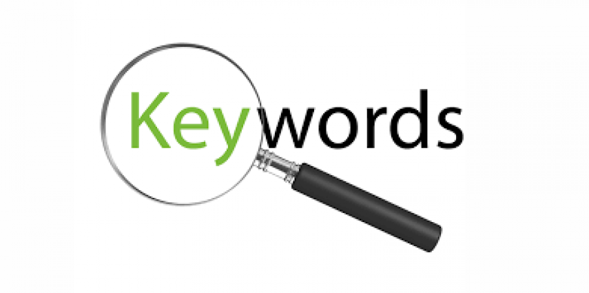 keywords text with a magnifying glass over the 'key' part of the phrase
